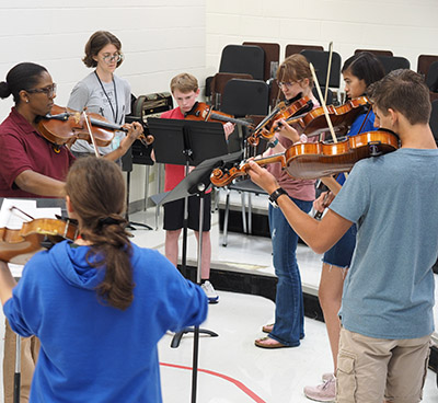 teacher and student viola players