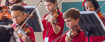 children playing violins