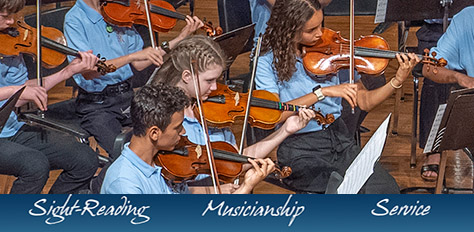 Students playing in a string orchestra