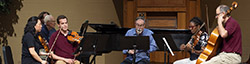 faculty playing clarinet quintet