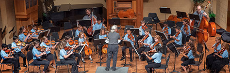 children playing in orchestra