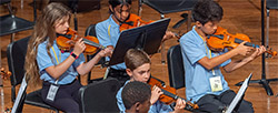 Children playing violins