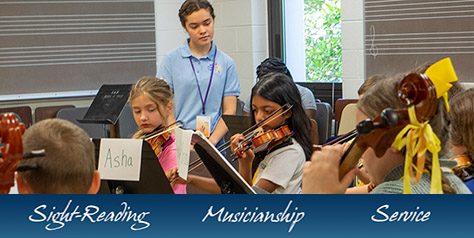 girl helping children learn music