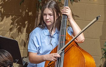 girl playing bass