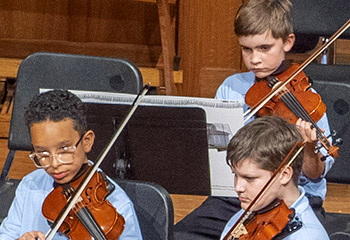 children playing violins