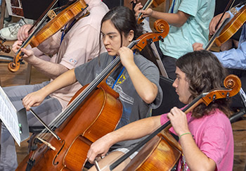 young people playing cello